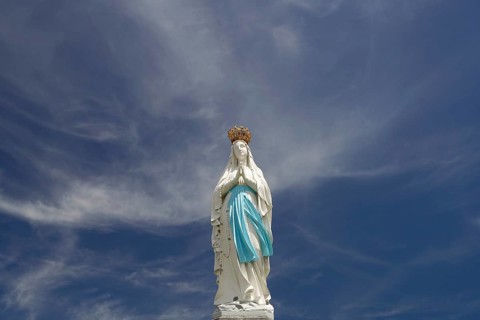 Statue of the Crowned Madonna of Our Lady in Lourdes on Rosary Square in the Marian pilgrimage town