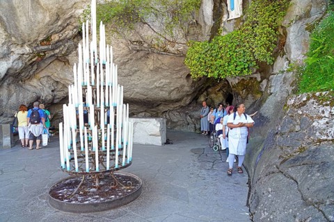 The Grotto of Massabielle in the Holy District in the Marian pilgrimage town of Lourdes, Pyrenees,