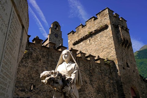 Monument in front of the Church of Saint-André or Church of the Templars in Luz-Saint-Sauveur,