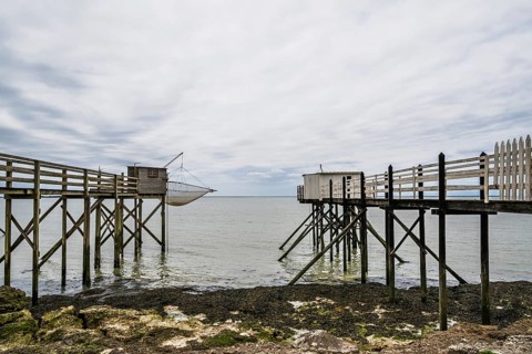 Fishing huts over Randonnee entre Histoire et Nature from a drone, Fouras, Fouras-les-Bains,