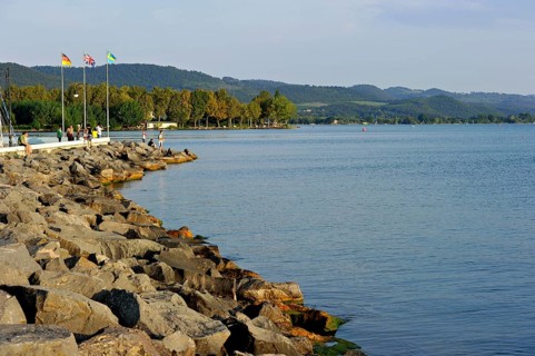 Quay with breakwater made of boulders, Bolsena marina, Porto Turistico di Bolsena, Lake Bolsena,