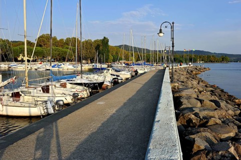 Quay with breakwater made of boulders, Bolsena marina, Porto Turistico di Bolsena, Lake Bolsena,