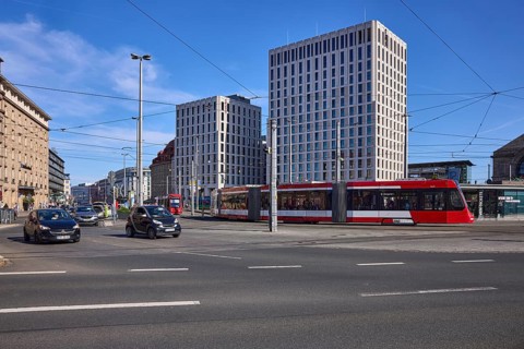 Traffic area, modern architecture, general development, tram, overhead lines, vehicles, lantern,
