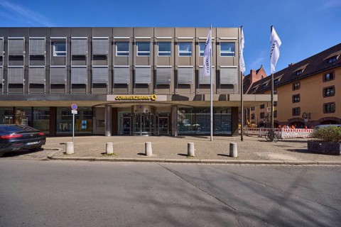 Commerzbank, modern architecture, flags, flagpoles, entrance area, barrier bollards, parking lane,