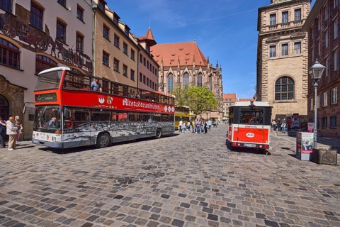 City sightseeing bus, tourist train, old town tour, pedestrian zone, cobblestones, historic