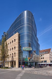 Maximum retail park, modern architecture, glass facade, blue sky, cirrostratus clouds, square,