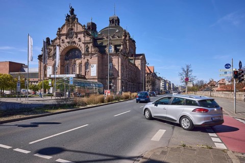 Nuremberg State Theatre, architect Christian Heinrich Seeling, flags, flagpoles, vehicles, opera