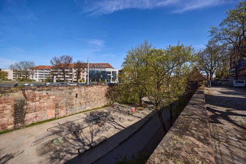 Old town, city fortification, city wall, modern architecture, general development, trees, skate