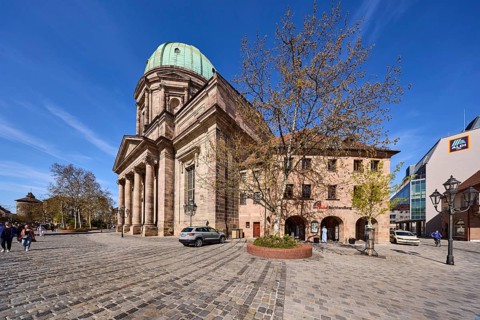 Church of St Elisabeth, dome, architectural style classicism, square, cobblestone pavement,