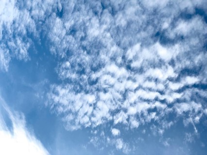 White clouds Cirrocumulus in front of blue sky. international