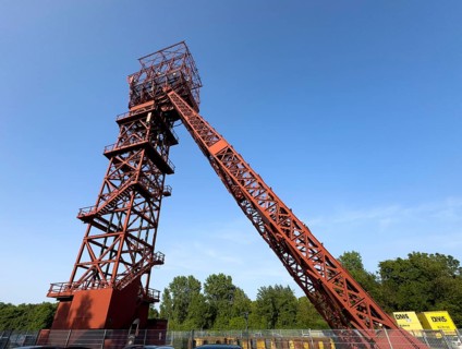 Historic red headframe historic red winding tower of Bonifacius colliery coal mine in mining region