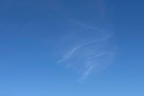 Delicate thin veil clouds Cirrus in front of blue sky. international