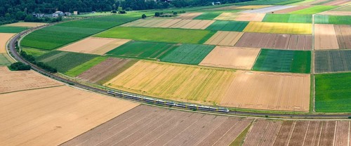 Agricultural area in the Neckarbogen near Lauffen am Neckar. Regional railway on the way. Lauffen