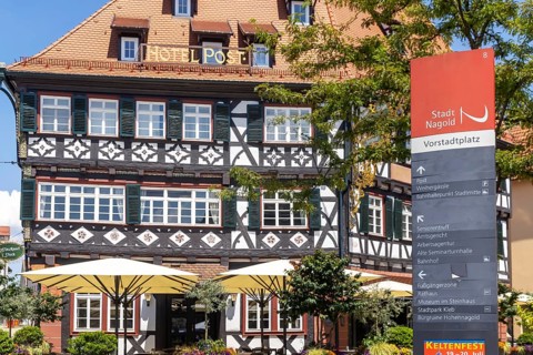Town view of Nagold in the northern Black Forest. Half-timbered house Hotel Post on the suburban
