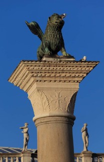 Piazzetta San Marco: St Mark's Column in front of the statues of the Bibliotheca National Marciana,