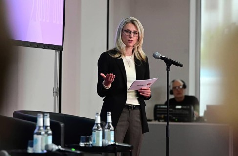 Dr Beatrice John from the consulting firm Adelphi speaks at a panel discussion organised by