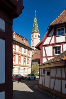 Iron lane with half-timbered houses and church tower of St. Maria am See, also known as Seekapelle,