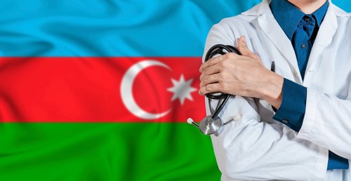 Doctor with stethoscope on Azerbaijan flag. Doctor holding stethoscope on Azerbaijan flag