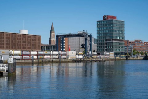 Modern commercial building at Schwedenkai, town hall tower, harbour, Kiel, Kiel Fjord, Baltic Sea,