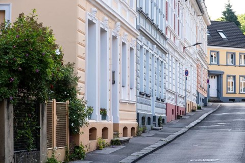 A street with apartment blocks from the Wilhelminian era in Wuppertal, Germany