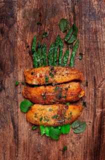 Fried fish fillet, tilapia with asparagus, homemade, no people