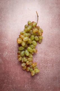 A branch of white grapes, wine grapes, Georgian grape variety Rkatsiteli, top view