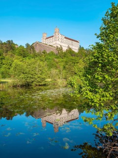 Willibaldsburg Castle is reflected in the River AltmÃ¼hl, AltmÃ¼hltal, EichstÃ¤tt, Upper Bavaria,