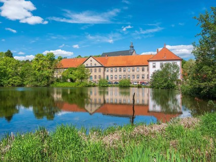 Lamspringe Monastery, reflection in the Lamme pond, Lower Saxony, Germany