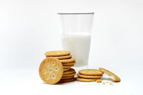 Cracker with a glass of milk
