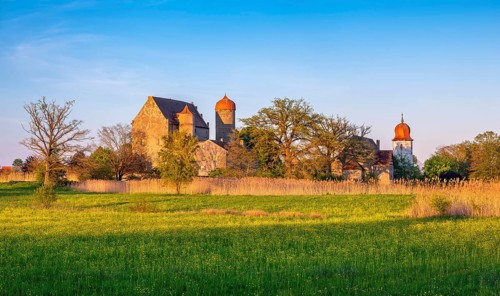 View over wildflower meadow at Sommersdorf Castle near Burgoberbach in the AltmÃ¼hl Valley in the