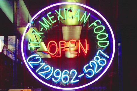 Illuminated advertising at a Mexican restaurant, Manhattan, New York City, USA