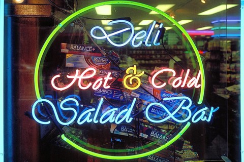 Illuminated advertising at a fast food restaurant, New York City, USA