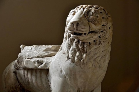 Lion as column base, stone figure, sculpture, ancient Etruscan sculpture, Museum of the Benedictine