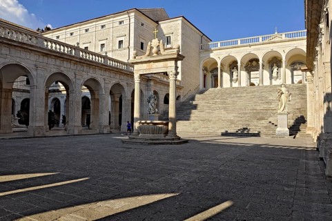 Bramante cloister with cistern and statues of St Benedict and St Scholastica of Nursia, Benedictine