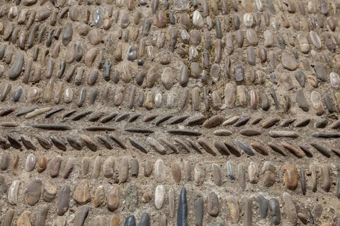 Street paving made of coloured pebbles, background, texture, Cordoba, Andalusia, Spain