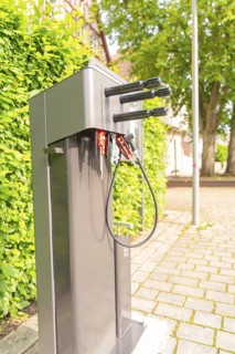 Bicycle repair station on paved ground with trees in the background, Nagold, district of Calw,