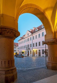 View of Hotel Börse through the arches of the New Town Hall of Görlitz, Lower Market Square -