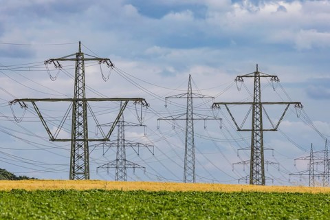Many high-voltage power lines and lattice towers in the district of Ludwigsburg near Besigheim,