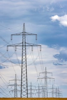 Many high-voltage power lines and lattice towers in the district of Ludwigsburg near Besigheim,