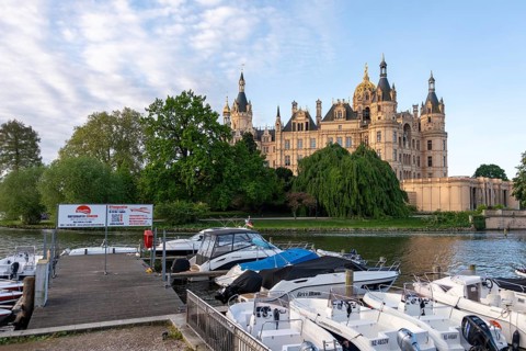 View of Schwerin Castle from the jetty on Lake Schwerin, Schwerin, Mecklenburg-Western Pomerania,