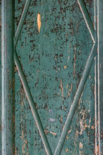 Old wooden door with peeling paint, texture, background, Germany
