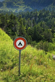 Prohibition sign Camping prohibited in the Alps on the Susten Pass, Switzerland