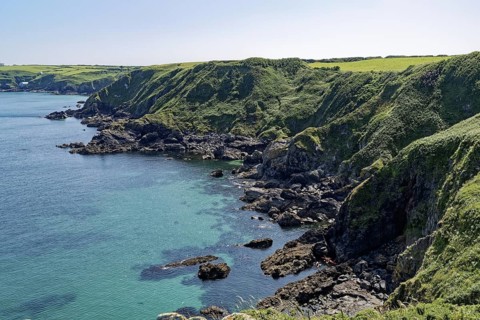 Rocky coast and landscape on the south-east coast near the southern tip of Cornwall on the English