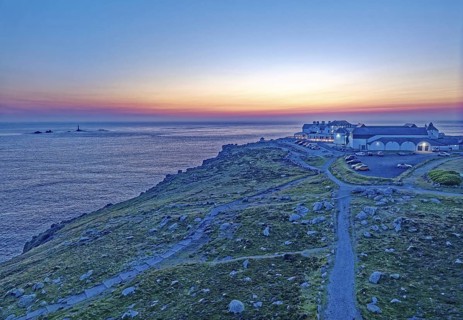 Land's End, landscape and hotel on the Atlantic, at dusk. Land's End, the tip of the headland in