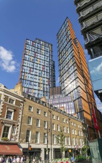 Tower block apartments of One Crown Place rise high above older properties, Sun Street, City of
