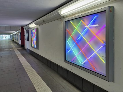 Eight light boxes by Albert Hien with neon systems in the subway at Celle railway station,