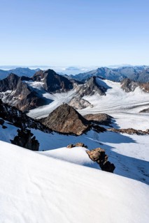 Snow on the Wilder Freiger mountain peak, picturesque high mountain landscape, view of