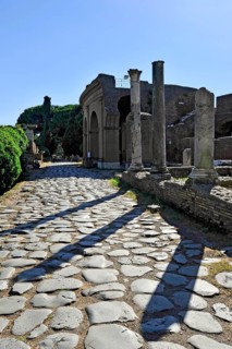 Ancient pavement of the main street Decumano Massimo, Roman theatre, columns, remains, ruins,