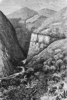 Deep valley of the Cordilleras, Sierra, mountain peak, river, rock face, cacti, palm trees, native