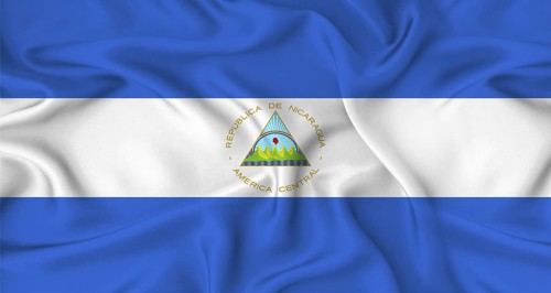 Realistic Nicaragua flag waving. Close up of flag of Nicaragua with cloth texture